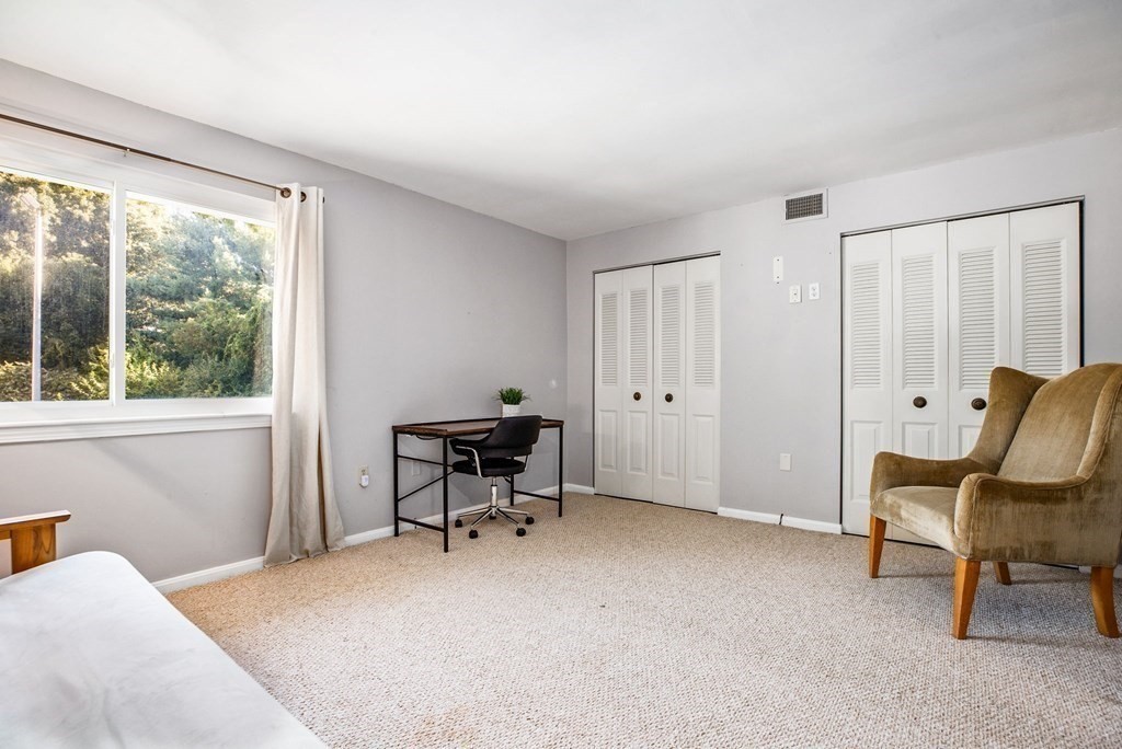5 Beal's Cove Road, Unit B Hingham, MA 02043 - Photo 20 of 27 a view of a livingroom with lounge chair and a window