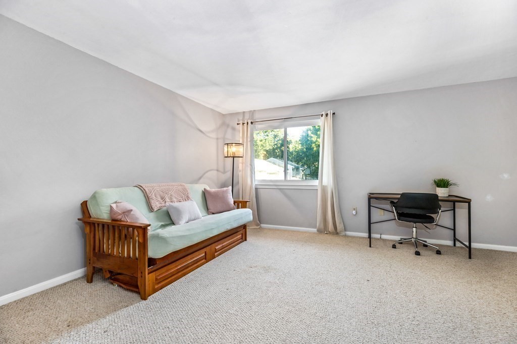 5 Beal's Cove Road, Unit B Hingham, MA 02043 - Photo 21 of 27 a living room with furniture and a window
