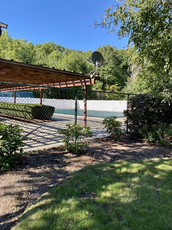 5 Beal's Cove Road, Unit B Hingham, MA 02043 - Photo 26 of 27 a view of a street with a bench
