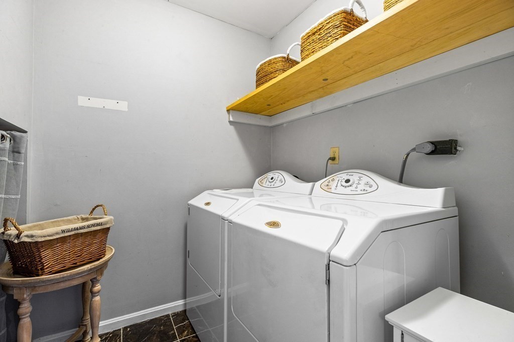 5 Beal's Cove Road, Unit B Hingham, MA 02043 - Photo 8 of 27 a utility room with dryer and washer