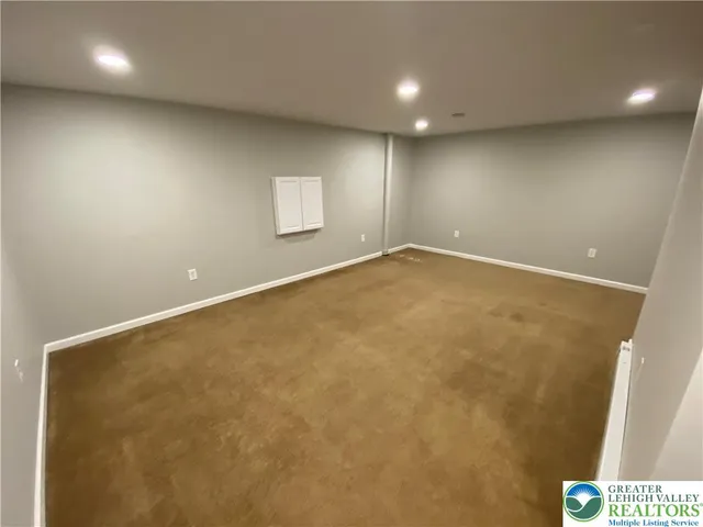 an empty room with a workbench