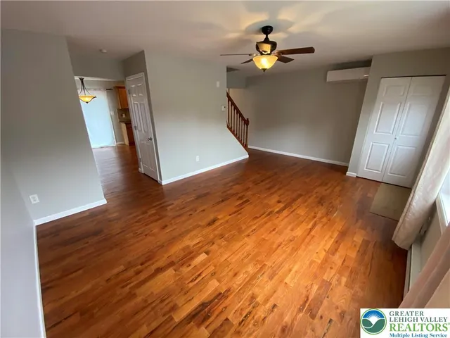 a view of entryway with wooden floor