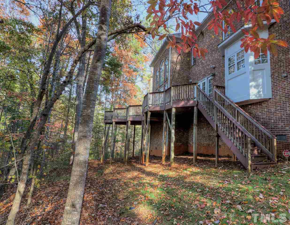 2408 Loring Court Raleigh, NC 27613 - Photo 23 of 25 a view of a house with a yard