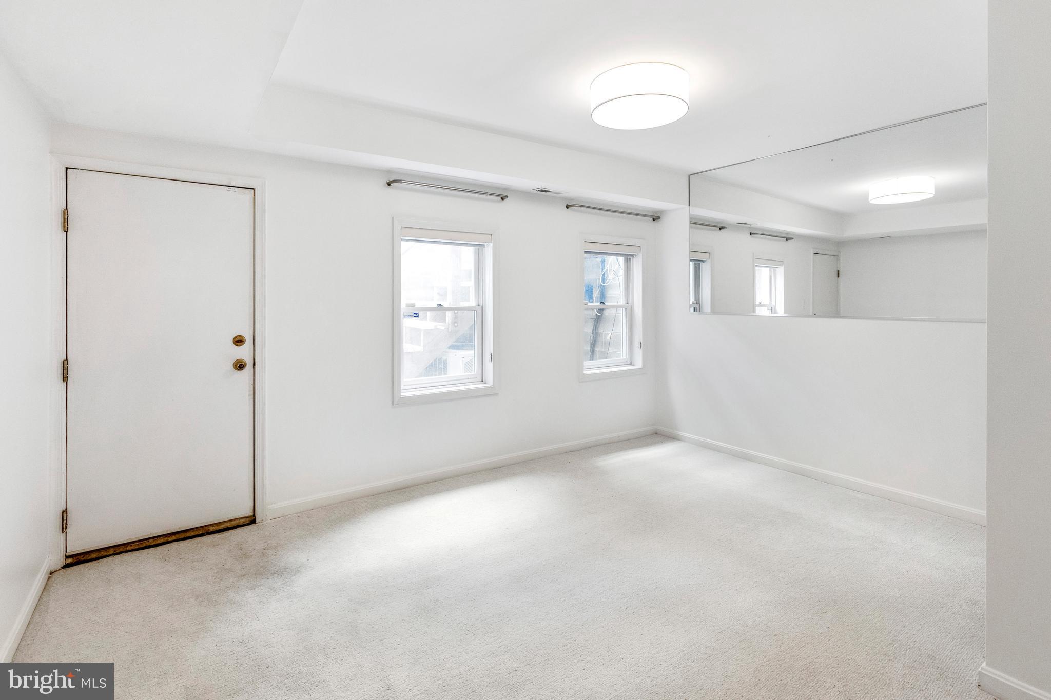 431 4th Street Northeast Washington, DC 20002 - Photo 27 of 37 an empty room with windows and closet