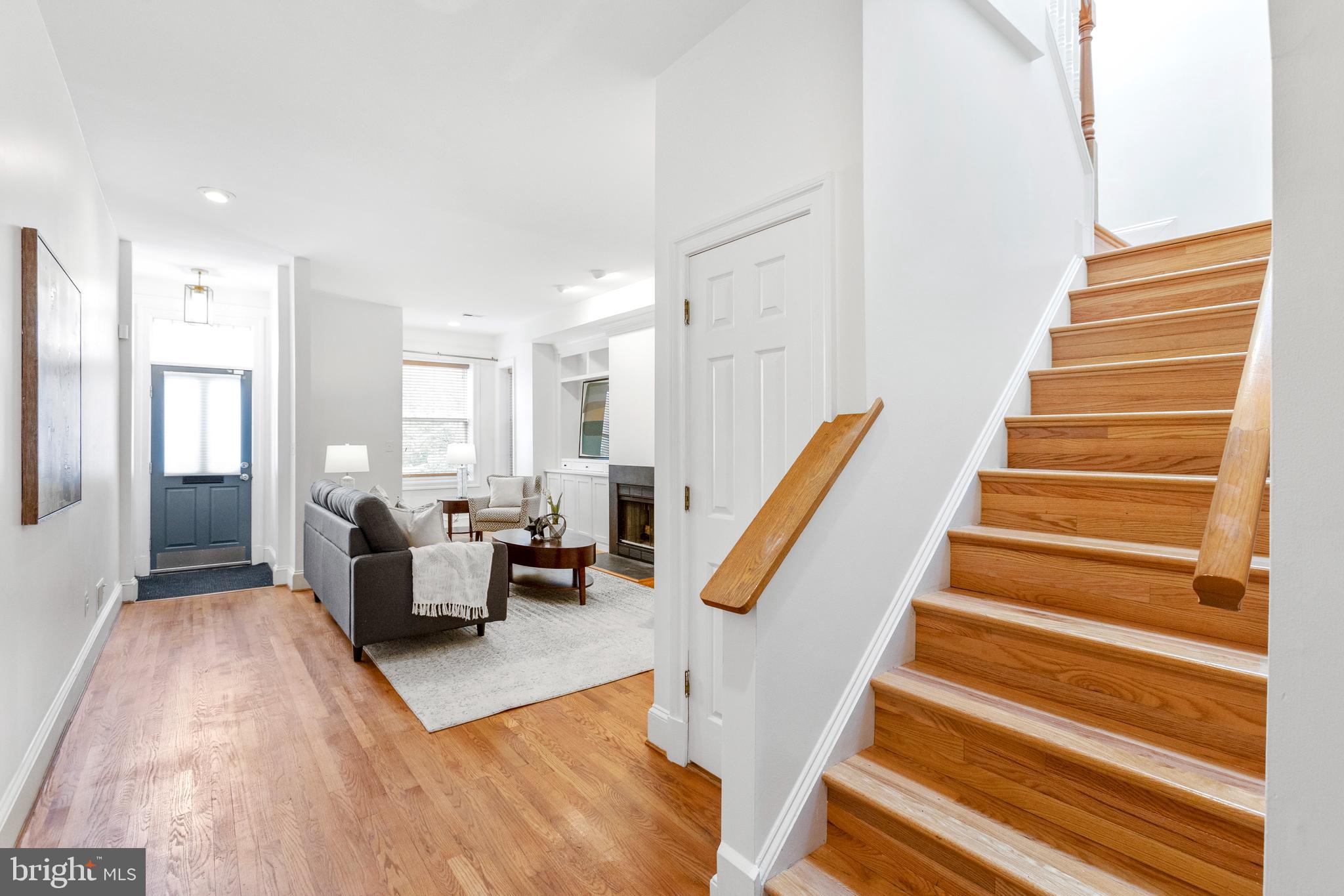 431 4th Street Northeast Washington, DC 20002 - Photo 5 of 37 a living room with furniture and stairs