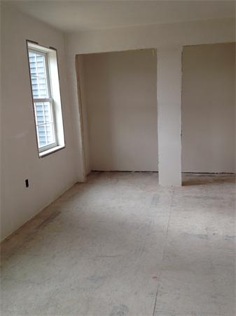 19 Shawnee Road, Unit 1 Pepperell, MA 01463 - Photo 16 of 18 an empty room with windows