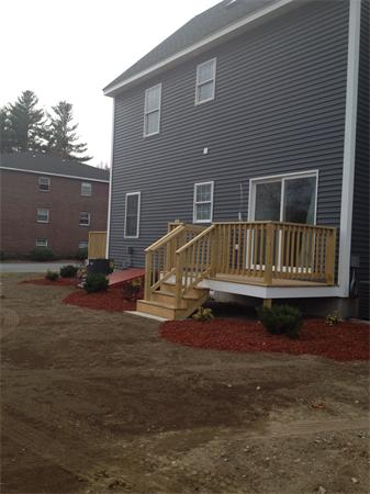 19 Shawnee Road, Unit 1 Pepperell, MA 01463 - Photo 4 of 18 a view of backyard with deck