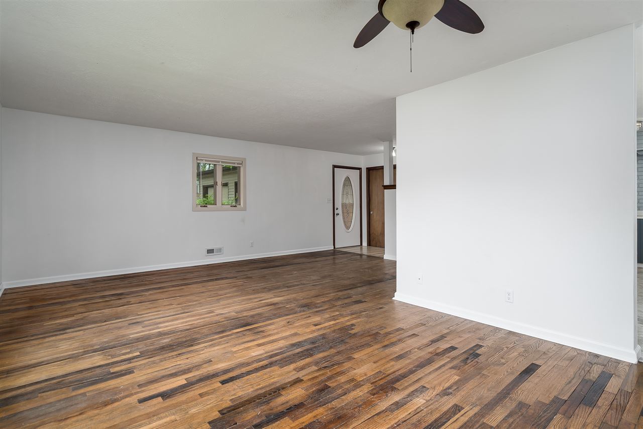 5114 Highcrest Road Rockford, IL 61107 - Photo 11 of 36 a view of empty room with wooden floor