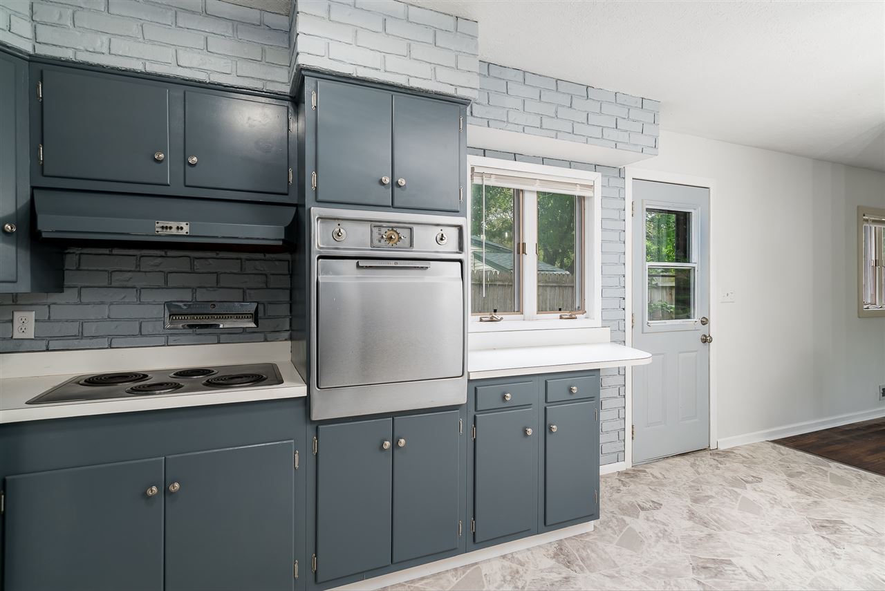5114 Highcrest Road Rockford, IL 61107 - Photo 16 of 36 a kitchen with a cabinets and steel appliances