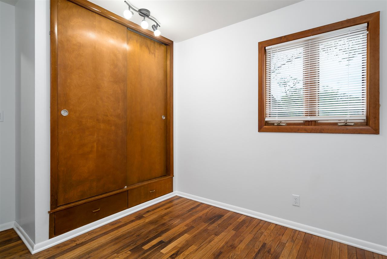 5114 Highcrest Road Rockford, IL 61107 - Photo 24 of 36 a view of an empty room with wooden floor and a window