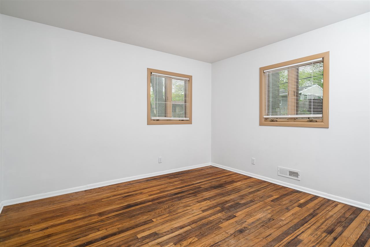 5114 Highcrest Road Rockford, IL 61107 - Photo 25 of 36 a view of empty room with wooden floor