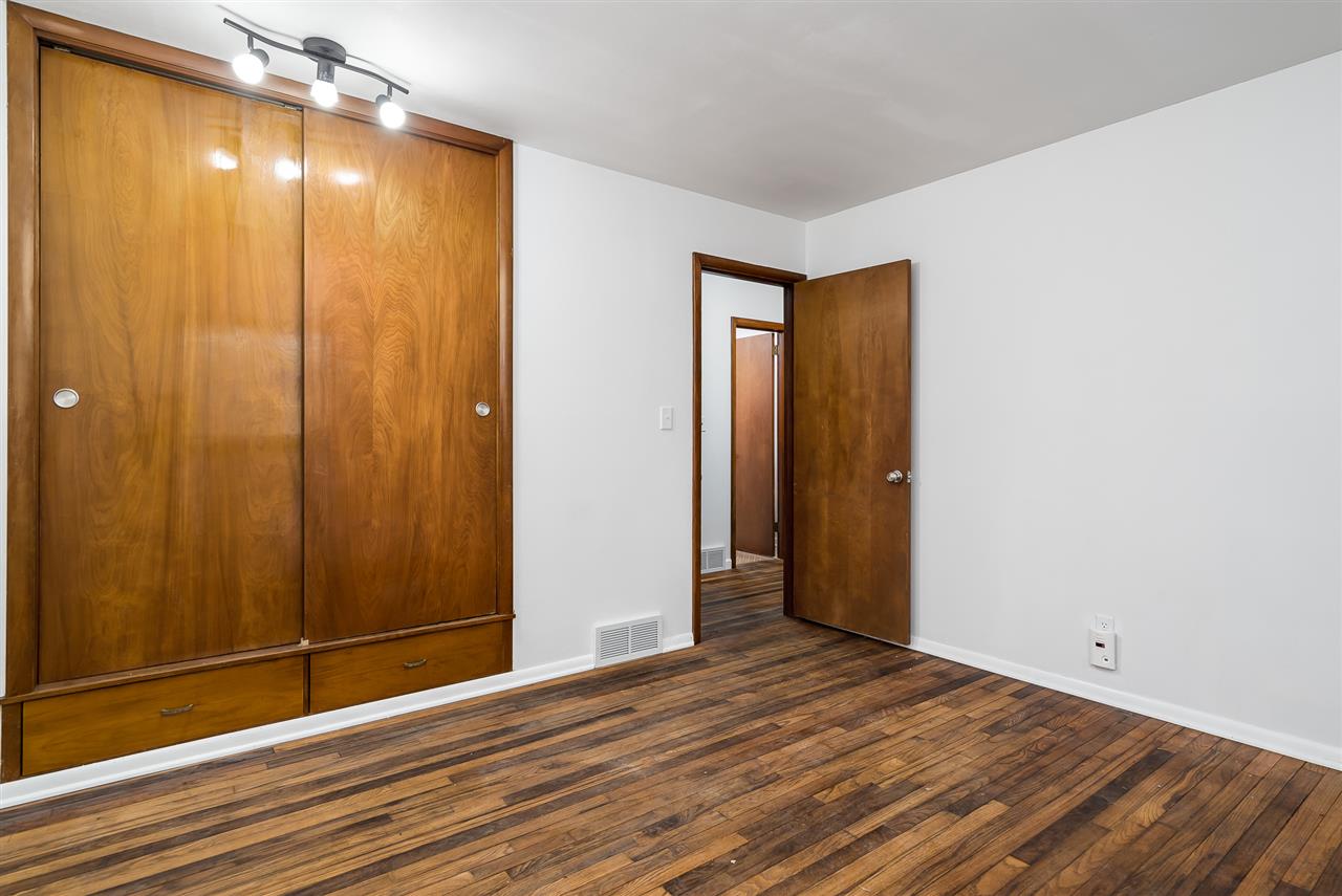 5114 Highcrest Road Rockford, IL 61107 - Photo 26 of 36 a view of a room with wooden floor and door
