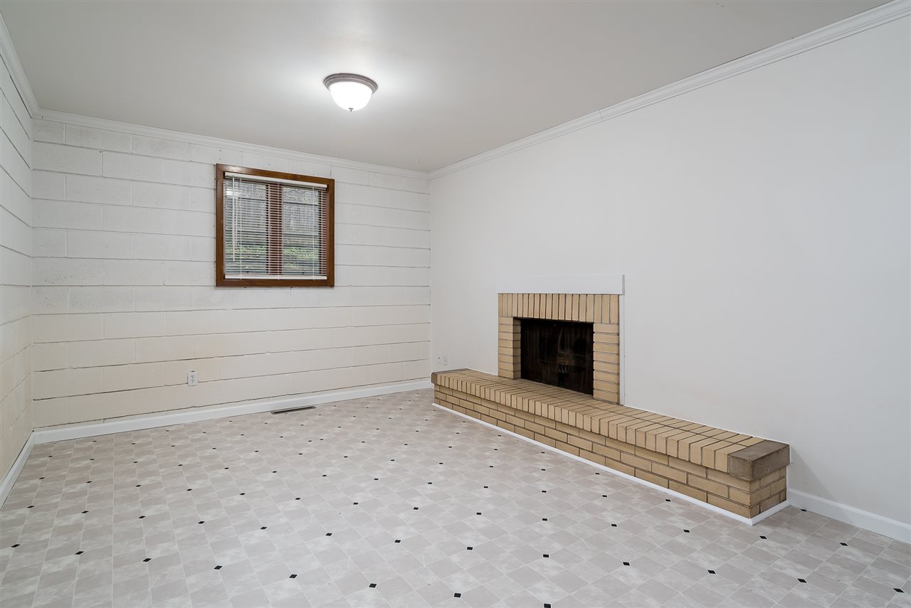 5114 Highcrest Road Rockford, IL 61107 - Photo 31 of 36 a view of an empty room with a fireplace
