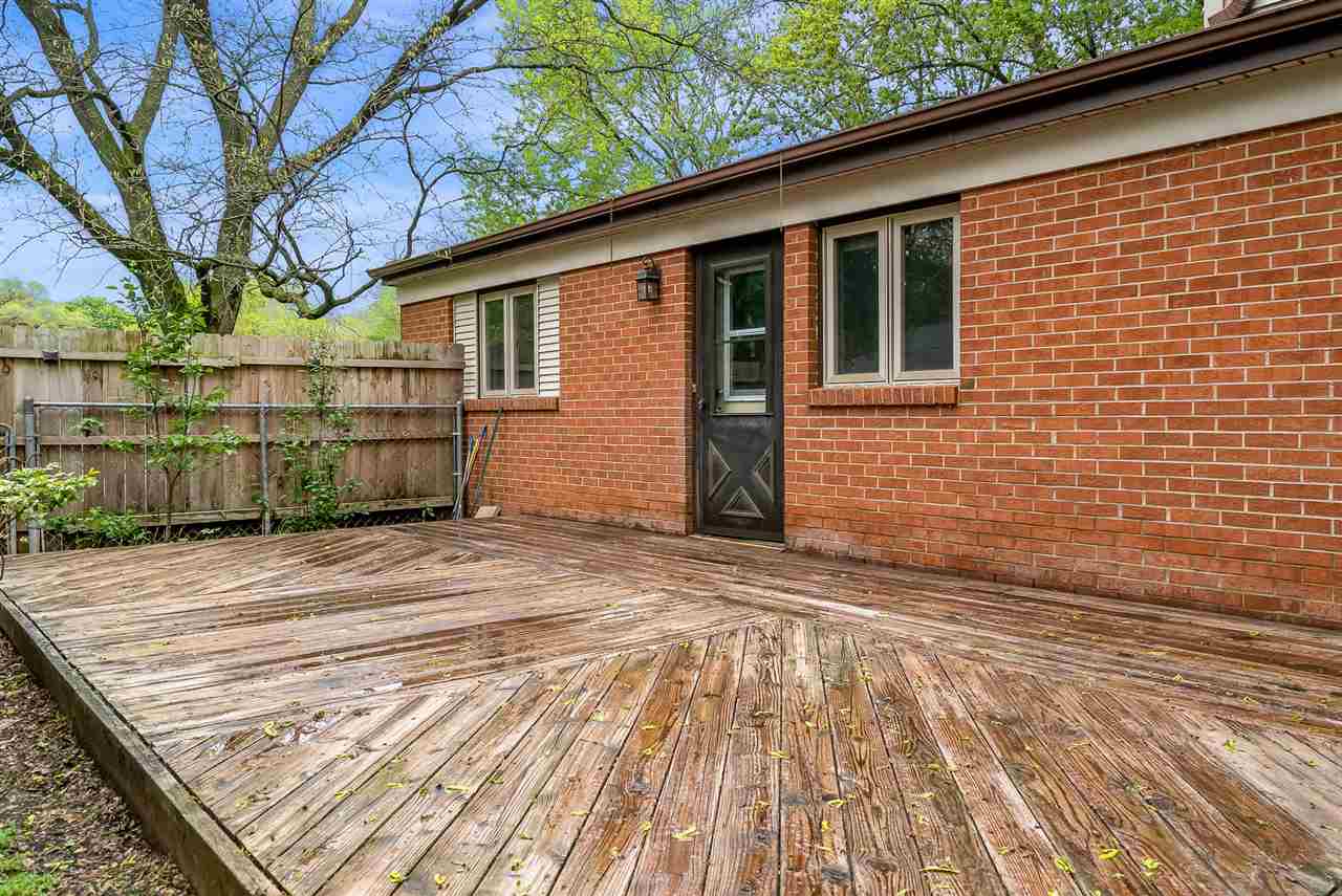 5114 Highcrest Road Rockford, IL 61107 - Photo 33 of 36 a view of a backyard of the house