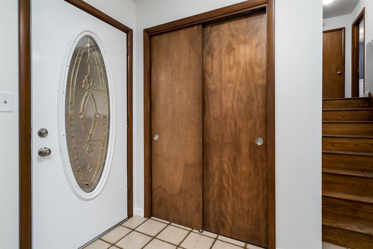 5114 Highcrest Road Rockford, IL 61107 - Photo 4 of 36 a view of a livingroom with a door and a mirror