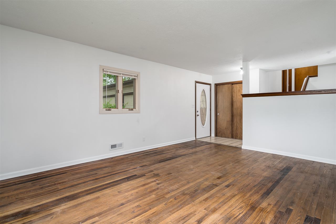 5114 Highcrest Road Rockford, IL 61107 - Photo 7 of 36 a view of empty room with wooden floor