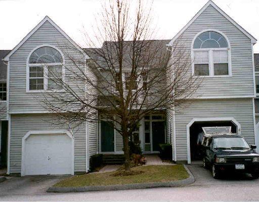 31 Rivendell Drive, Unit 31 Shelton, CT 06484 - Photo 1 of 1 a front view of a house with a yard