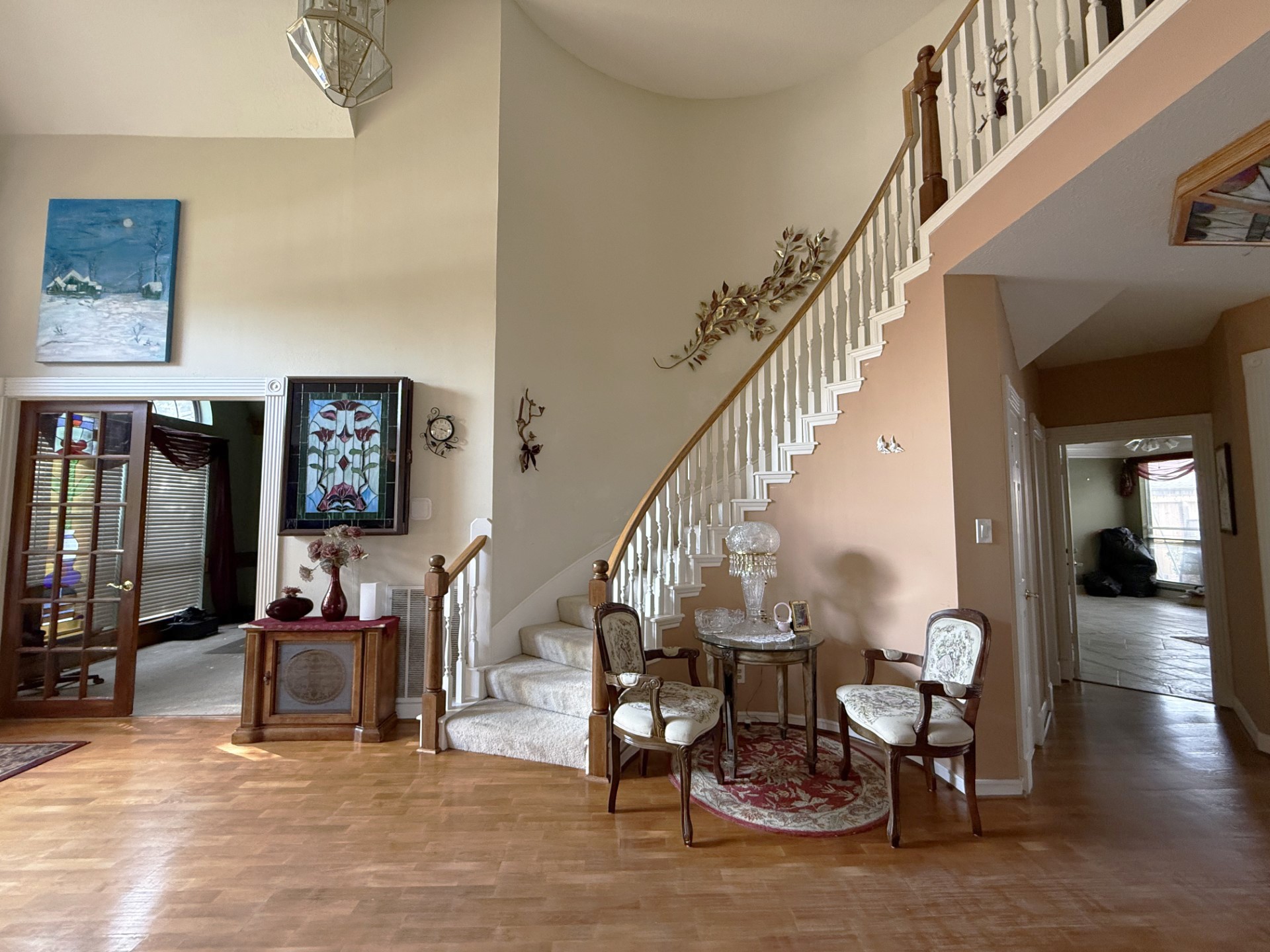 17310 Wyeth Circle Spring, TX 77379 - Photo 11 of 50 a living room with couches and a dining table with wooden floor