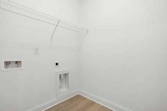 a view of a room with racks on the wall