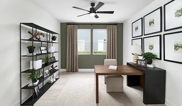 a dining room with furniture and a window