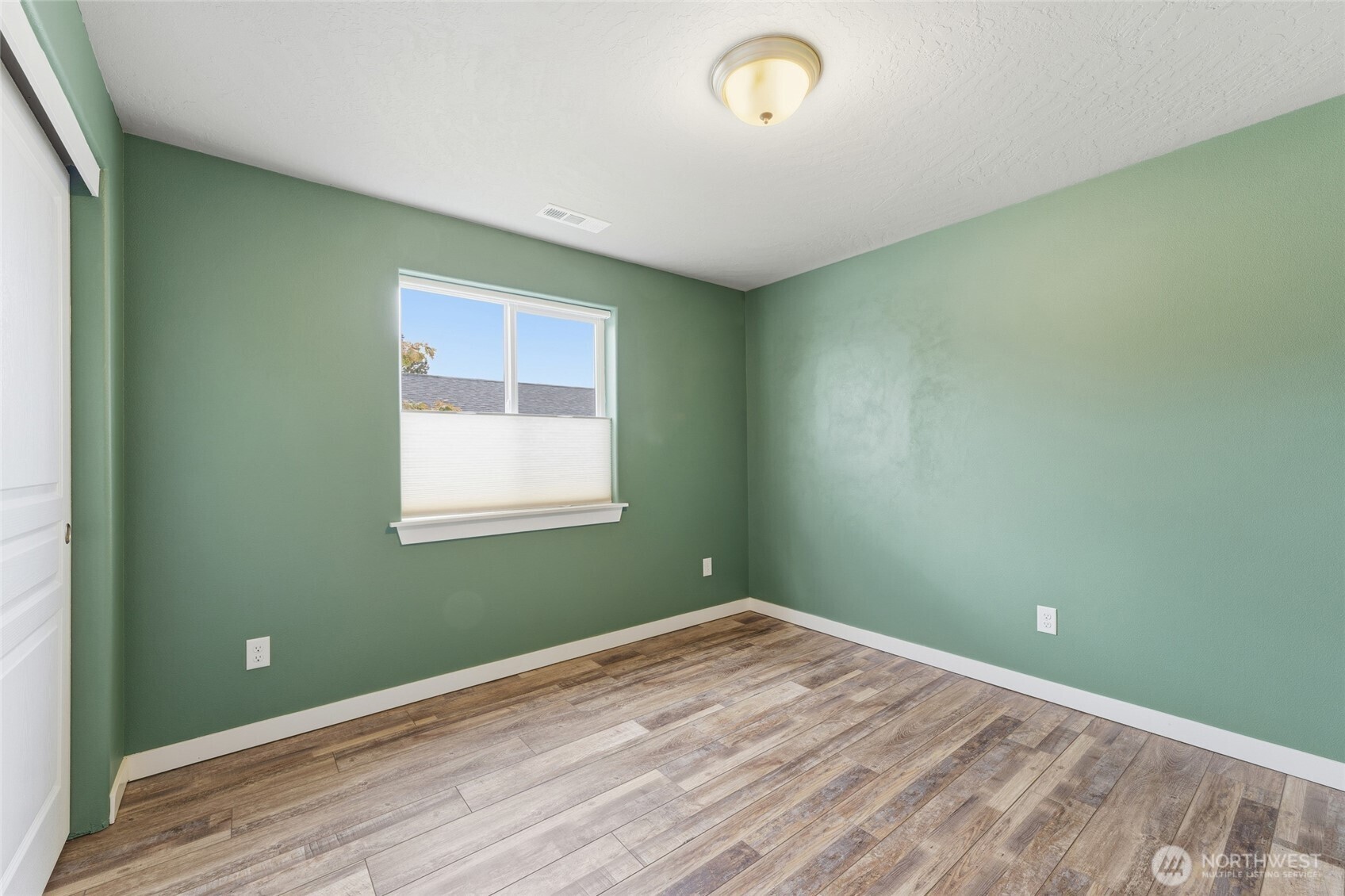1339 Caprio Loop Walla Walla, WA 99362 - Photo 12 of 37 a view of a room that has a window in it