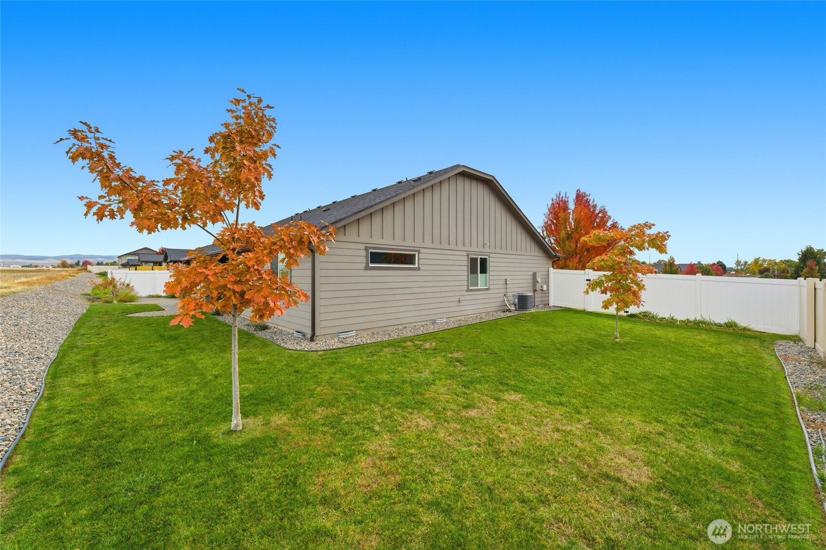 1339 Caprio Loop Walla Walla, WA 99362 - Photo 21 of 37 a view of a house with a yard