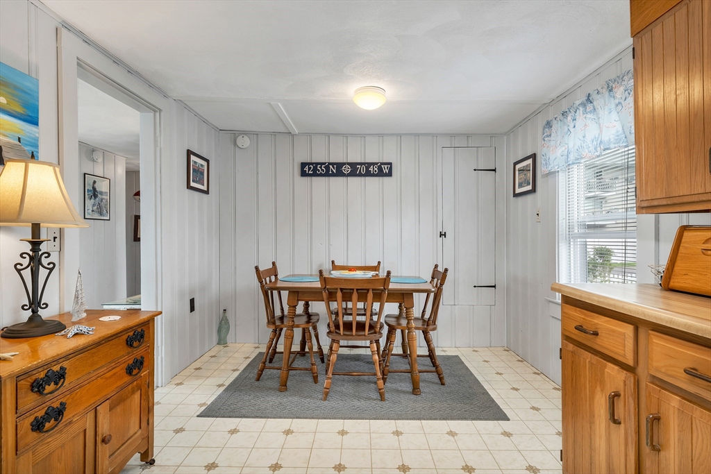 558 Winnacunnet Road Hampton, NH 03842 - Photo 24 of 40 a view of a dining room with furniture