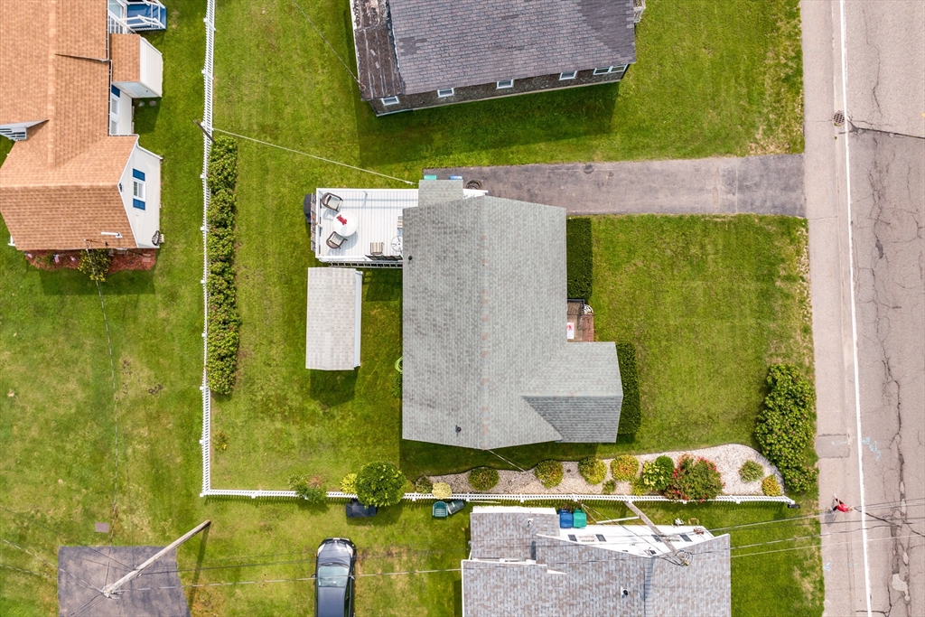 558 Winnacunnet Road Hampton, NH 03842 - Photo 10 of 40 an aerial view of a house with a swimming pool