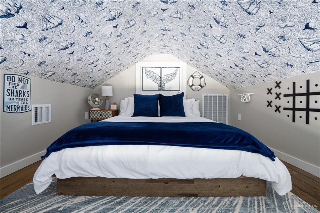 1053 Johnson Road Port Bolivar, TX 77617 - Photo 15 of 27 a bedroom with a bed and a window