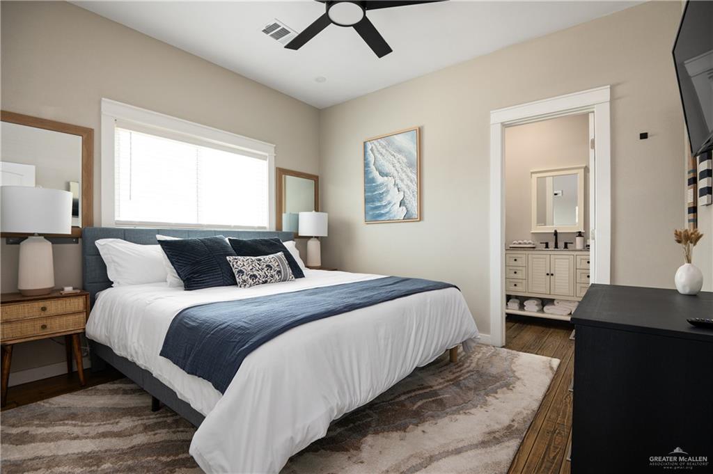 1053 Johnson Road Port Bolivar, TX 77617 - Photo 16 of 27 a bedroom with a bed and a desk