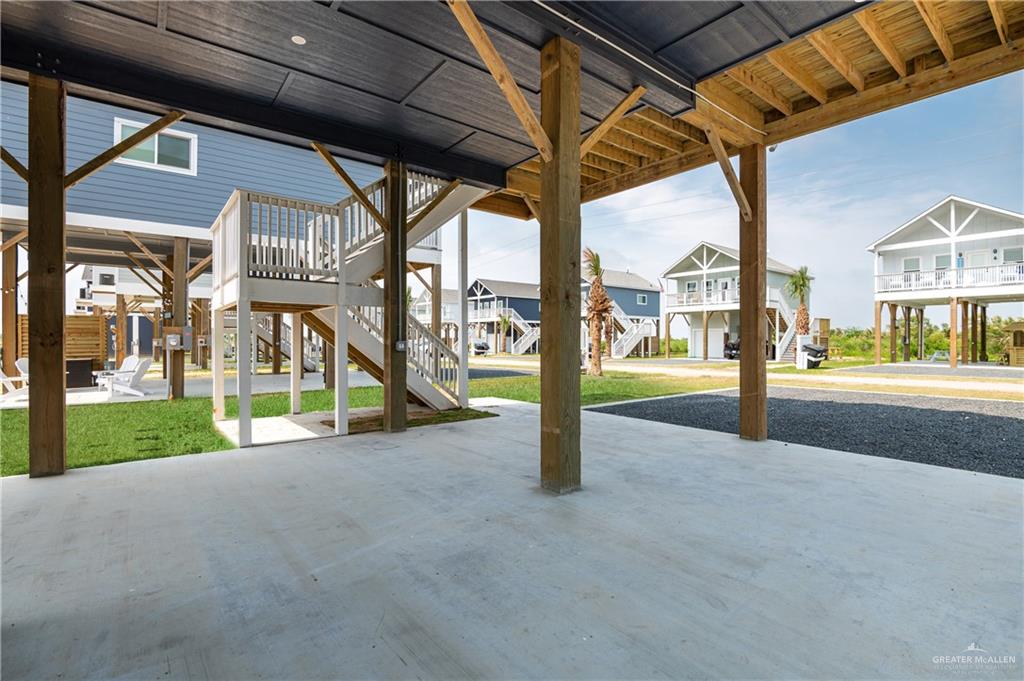 1053 Johnson Road Port Bolivar, TX 77617 - Photo 7 of 27 a view of a house with a big yard