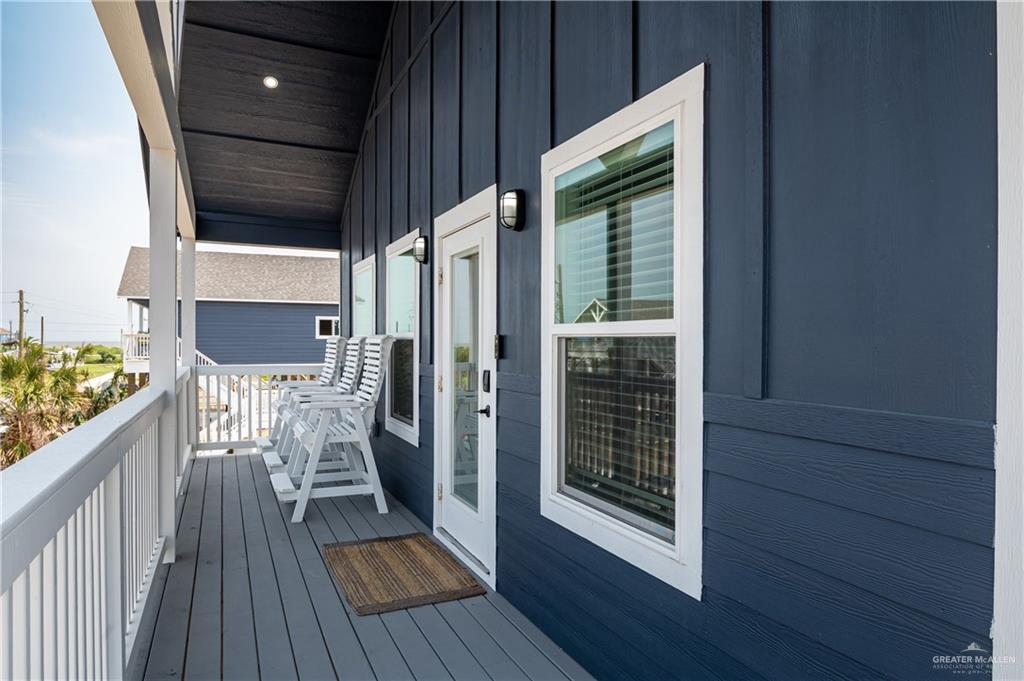 1053 Johnson Road Port Bolivar, TX 77617 - Photo 8 of 27 a view of a balcony with wooden floor