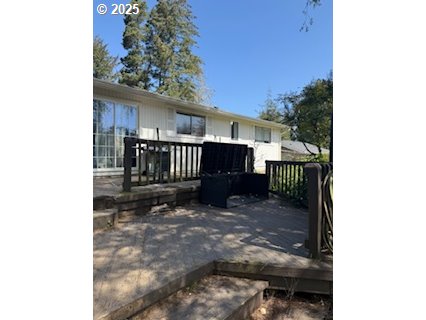 5590 South Shore Drive Florence, OR 97439 - Photo 9 of 11 a view of a porch with a yard