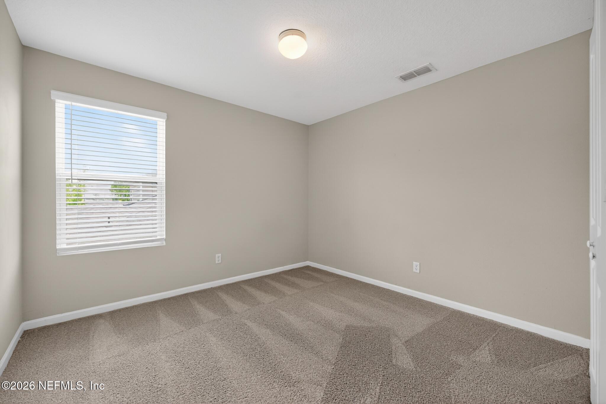 4818 Morning Rise Circle Jacksonville, FL 32218 - Photo 16 of 33 16_4818_Morning_Rise_Cir-Bedroom-8495