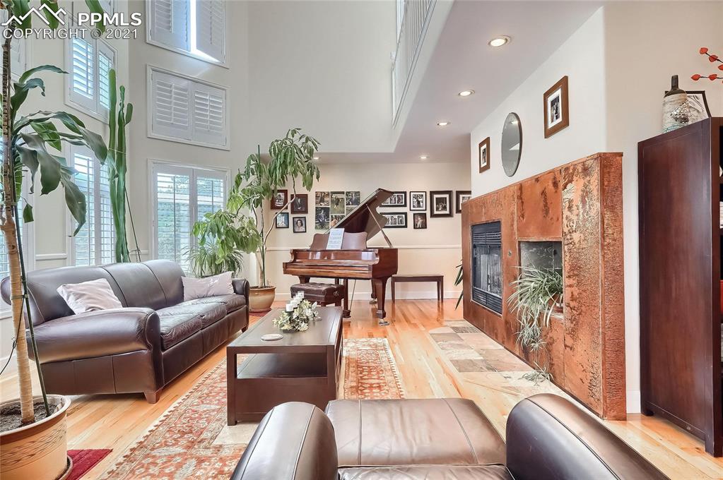 623 West Meadow Road Evergreen, CO 80439 - Photo 13 of 49 a living room with furniture and wooden floor