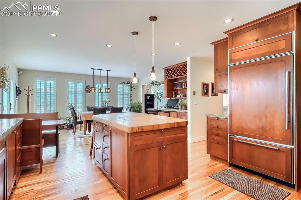623 West Meadow Road Evergreen, CO 80439 - Photo 26 of 49 a kitchen with stainless steel appliances granite countertop a refrigerator a sink and a stove