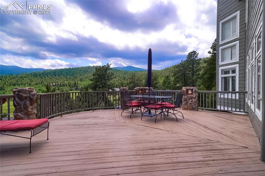 623 West Meadow Road Evergreen, CO 80439 - Photo 7 of 49 a view of a terrace with furniture
