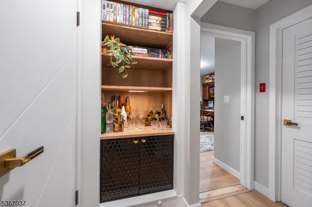 a bathroom with a sink toilet and a mirror