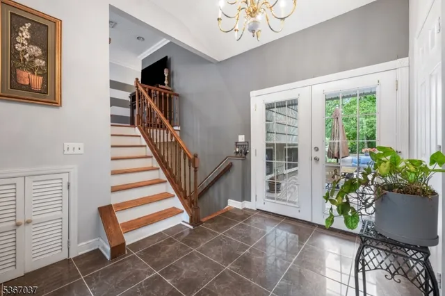 a view of entryway with wooden floor and a potted plant