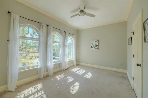 an aerial view of a house with yard