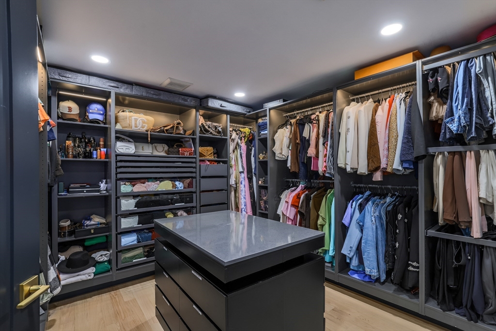 17 Institute Road Grafton, MA 01536 - Photo 19 of 35 a view of walk in closet with clothes and shoes