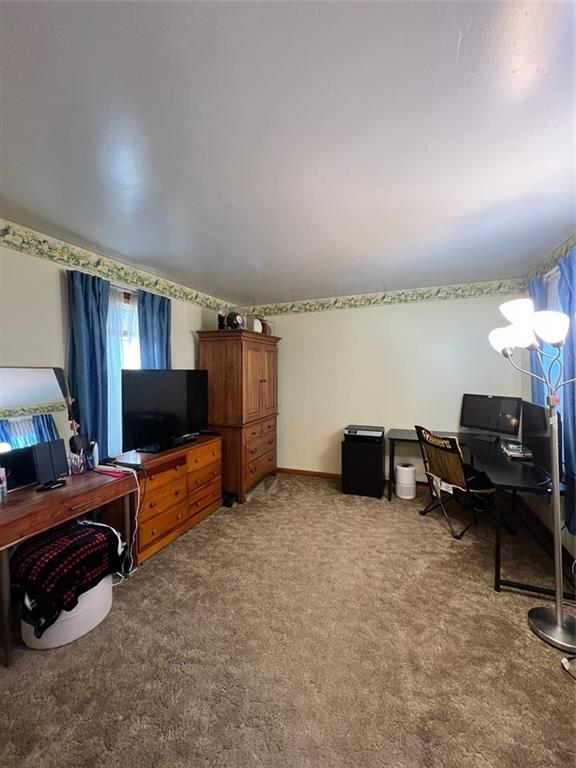 208 Morton Avenue Butler, PA 16001 - Photo 19 of 28 a bedroom with furniture and a flat screen tv