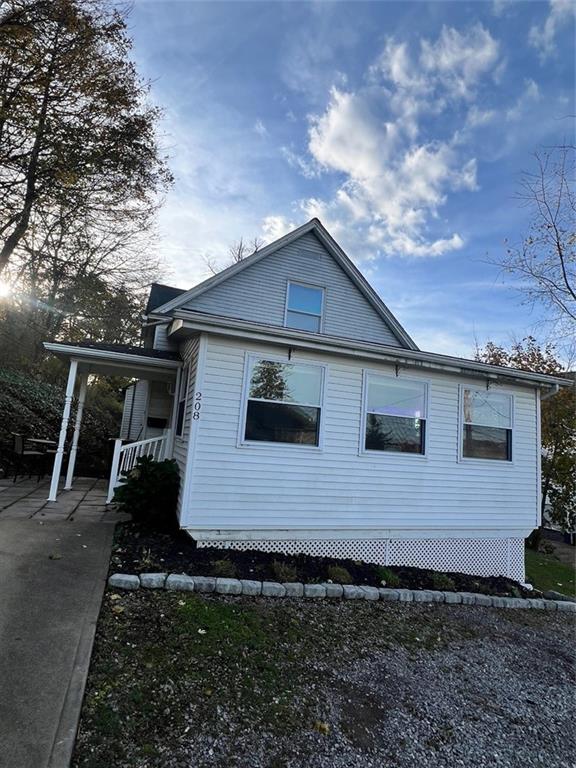 208 Morton Avenue Butler, PA 16001 - Photo 2 of 28 a front view of a house with garden
