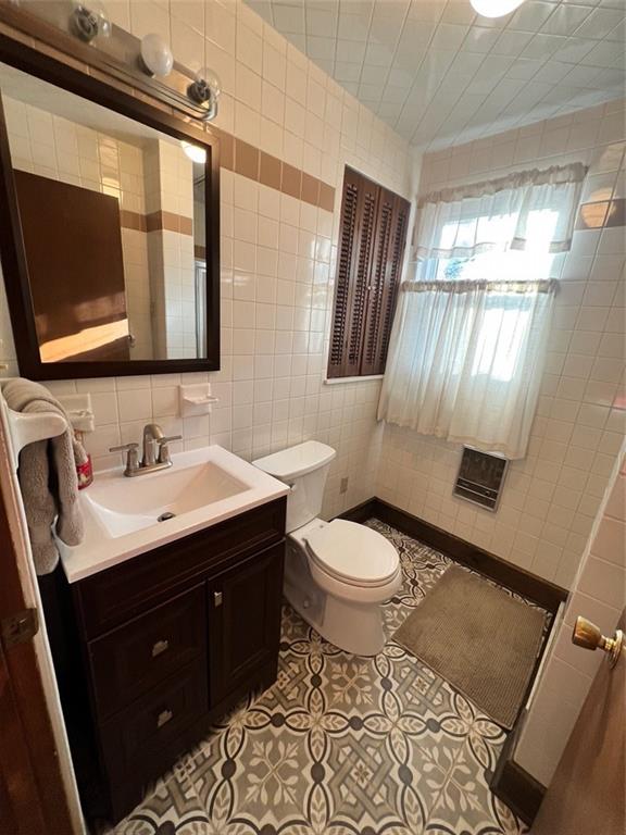 208 Morton Avenue Butler, PA 16001 - Photo 22 of 28 a bathroom with a sink toilet and mirror