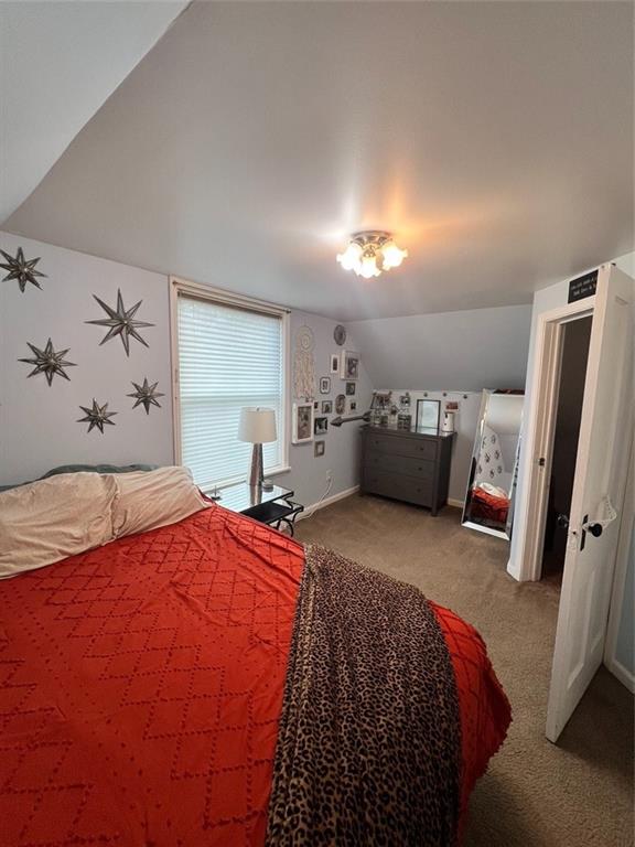 208 Morton Avenue Butler, PA 16001 - Photo 23 of 28 a bedroom with a bed and a couch