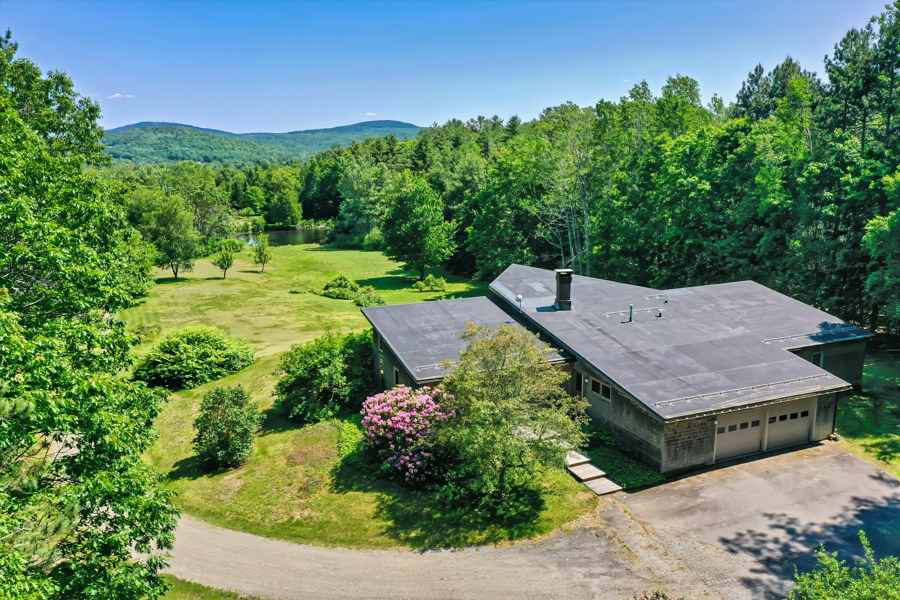 557 S Road Holden, ME 04429 - Photo 1 of 34 Rear view to fields and Pond