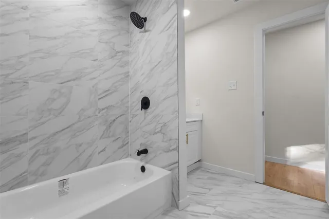 a bathroom with a bathtub