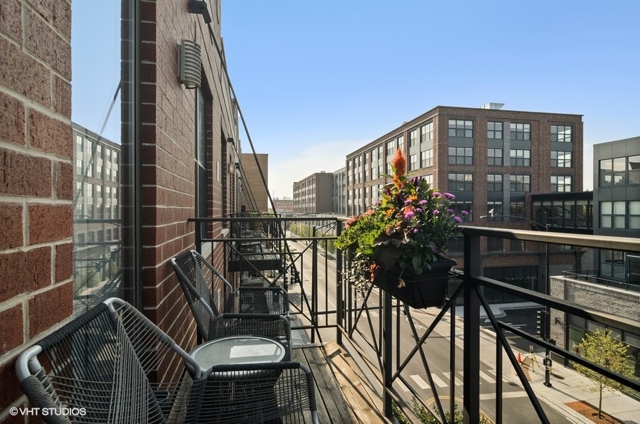 Undisclosed Address Chicago, IL 60647 - Photo 19 of 26 a view of balcony and patio