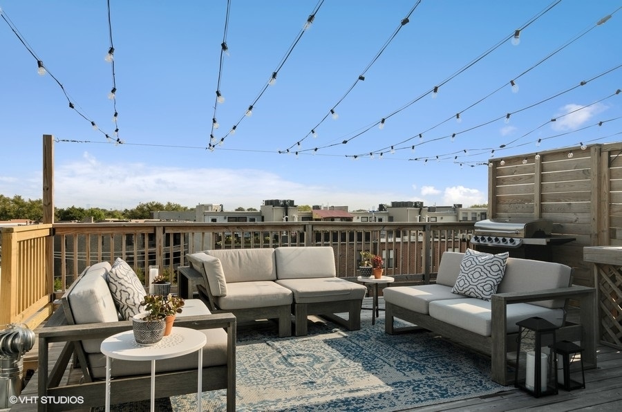 Undisclosed Address Chicago, IL 60647 - Photo 21 of 26 a terrace view with seating space