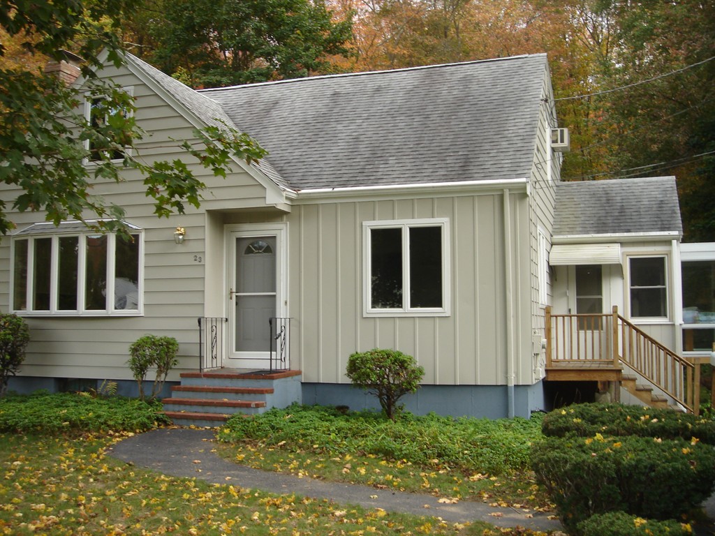 23 Lyndon Road Sharon, MA 02067 - Photo 1 of 17 a front view of a house with garden